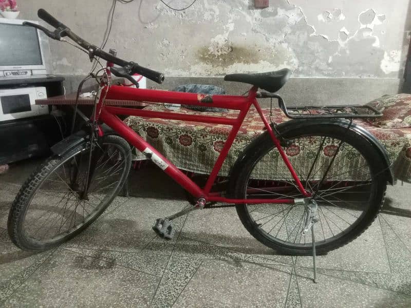 Red and black bicycle for 13 to 18 years old boys ,, good condition 0