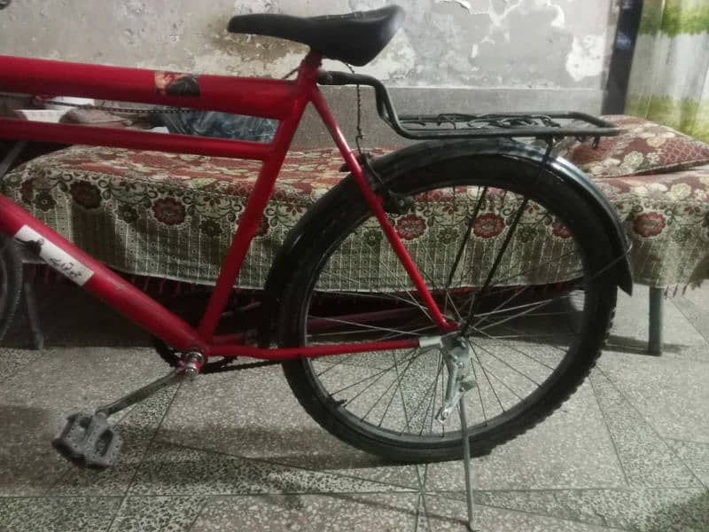 Red and black bicycle for 13 to 18 years old boys ,, good condition 1