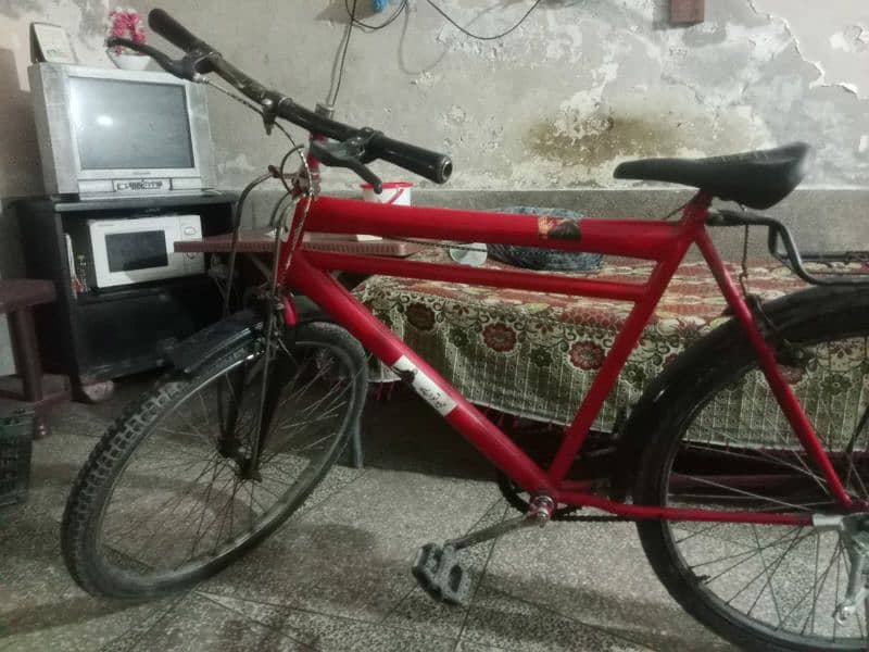Red and black bicycle for 13 to 18 years old boys ,, good condition 2