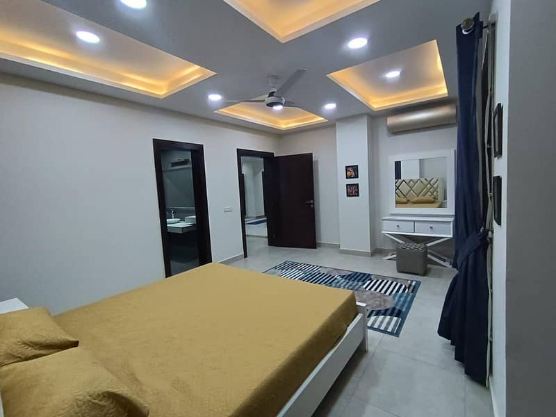 For rent two bed luxury furnished apartment in Bahria town phase 2 11
