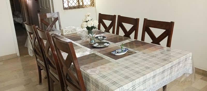 8 Seater wooden dinning table for sale 0