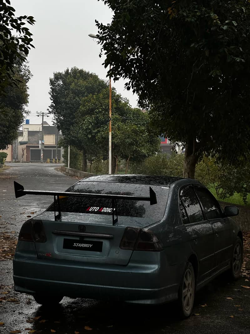 Honda civic vti oriel (cat eye) 0