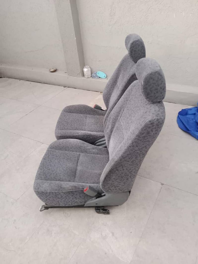 Toyota Indus Corolla and Corolla 2 seats 1