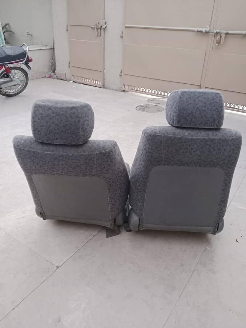 Toyota Indus Corolla and Corolla 2 seats 2