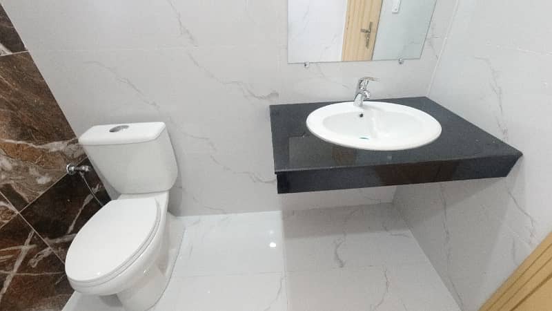 8 Marla Brand New House Available For Sale  in Faisal Town phase 1 of block A Islamabad 8