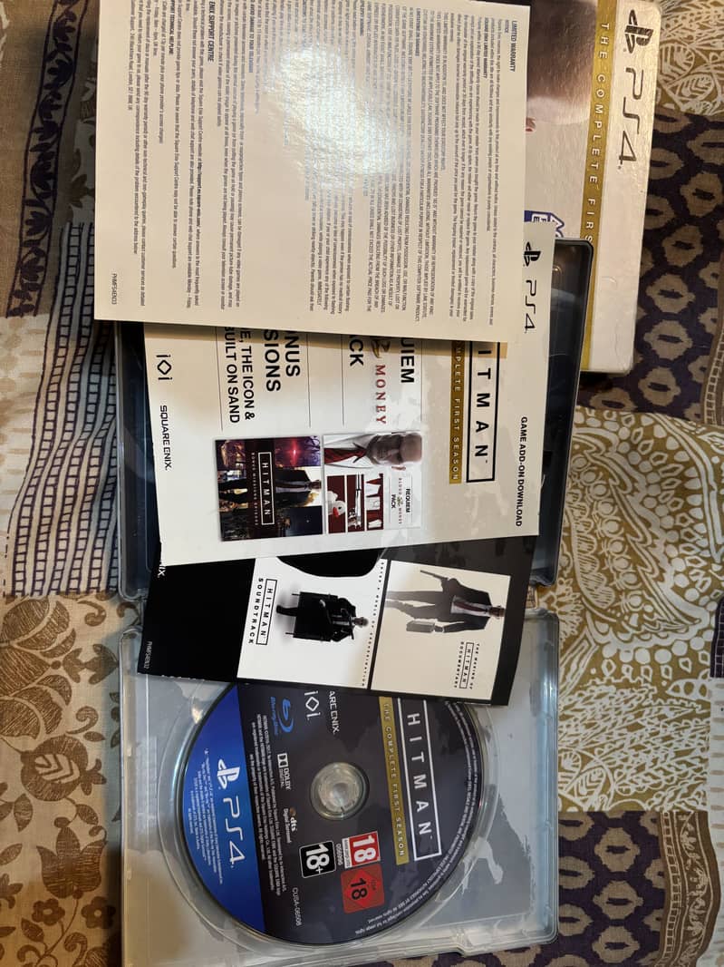 play station 4 cds each cost 5000 1