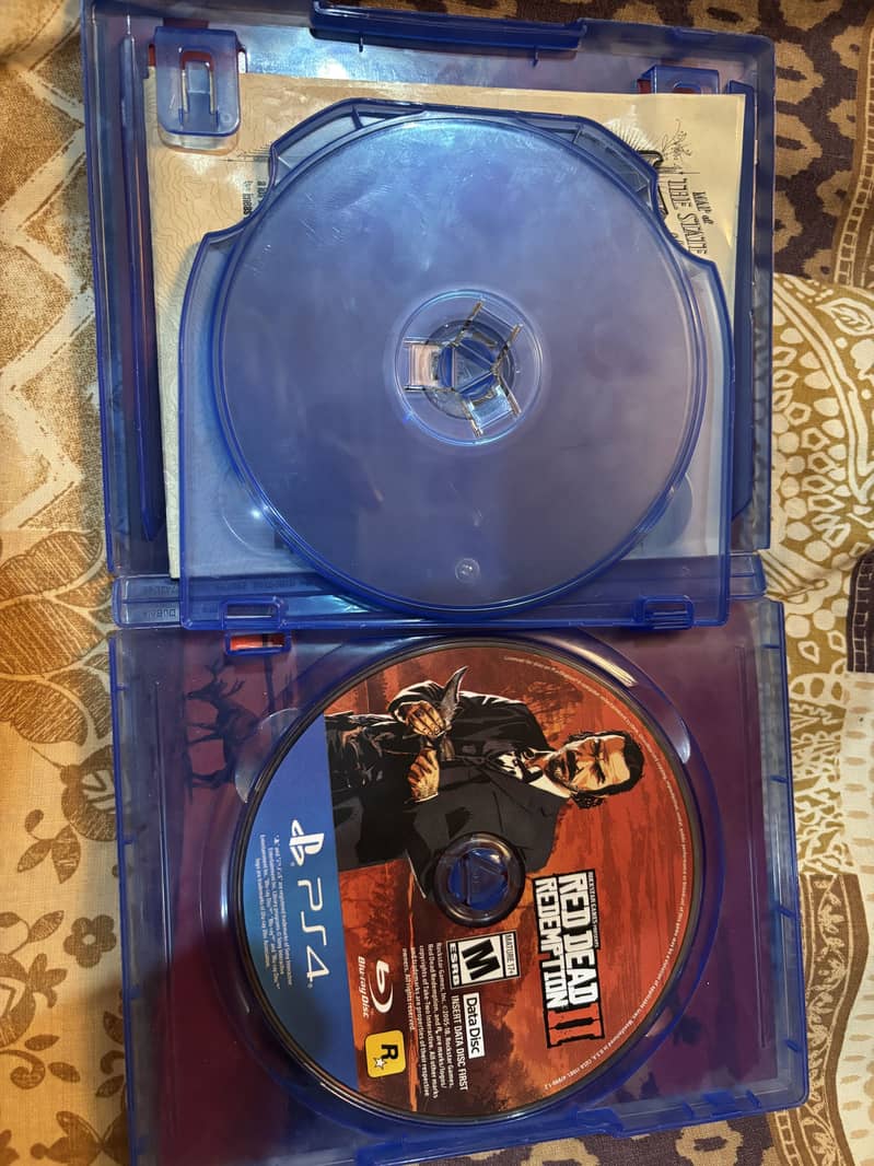 play station 4 cds each cost 5000 9