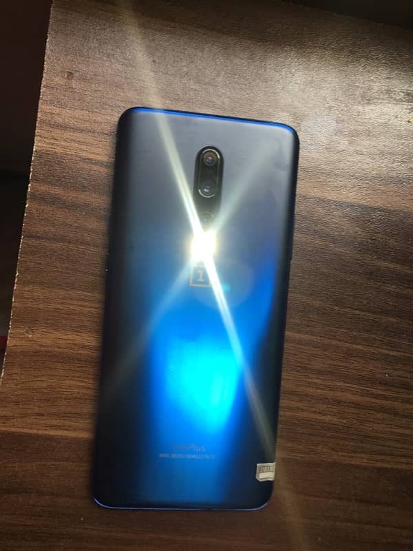 oneplus 7pro 8 256 GB  light sa shade hai urgent sale karna hai 1