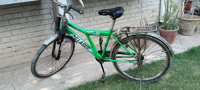 green color 24" bicycle for sale 0