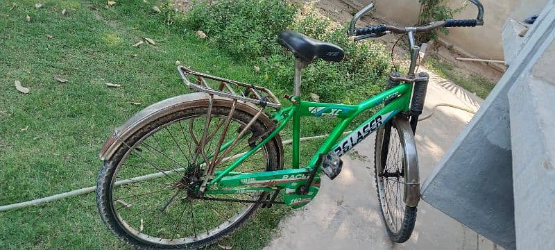 green color 24" bicycle for sale 1