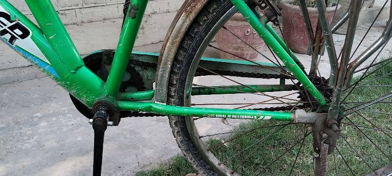 green color 24" bicycle for sale 2