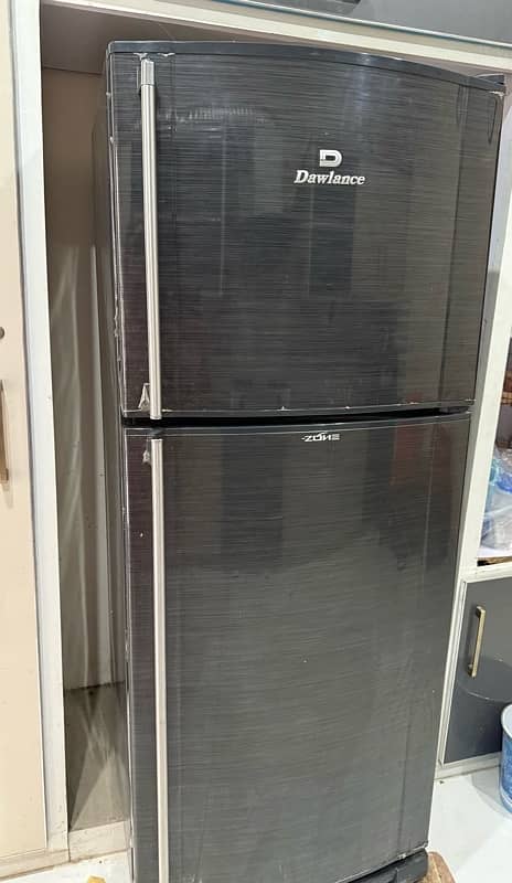 New condition grey black clr company Dawlance 1
