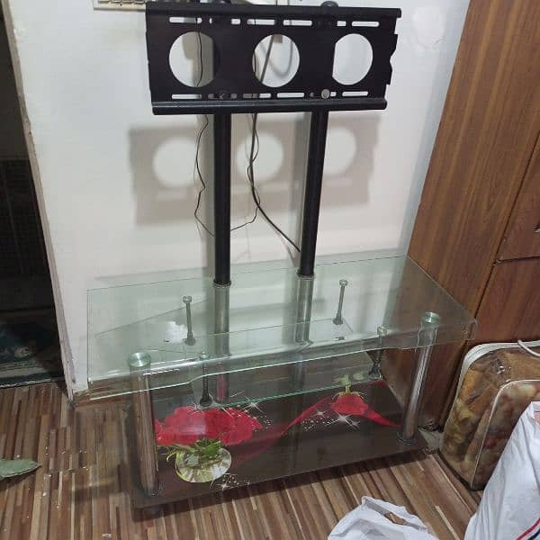Tv table made of glass in excellent condition 0