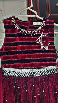 red velvet frock with embroidery net  , length 29 Inch,fitting 12 inch