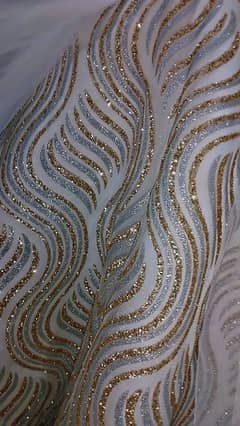 white fairy frock with golden embroidery length 32 ,fitting 13 Inch