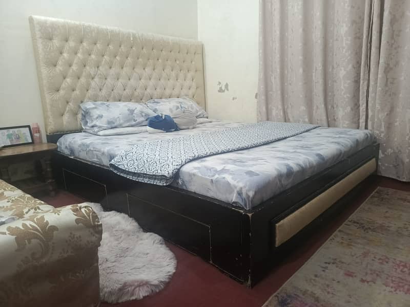 King size used bed with storage option. 1