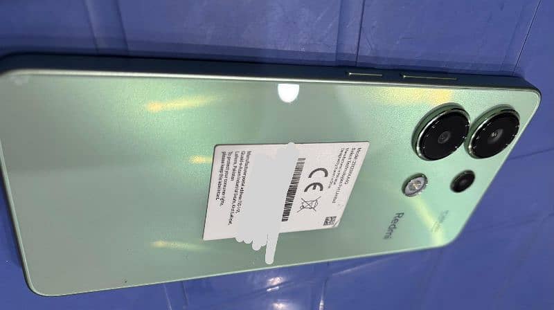 Redmi note 13 mint green color. 5