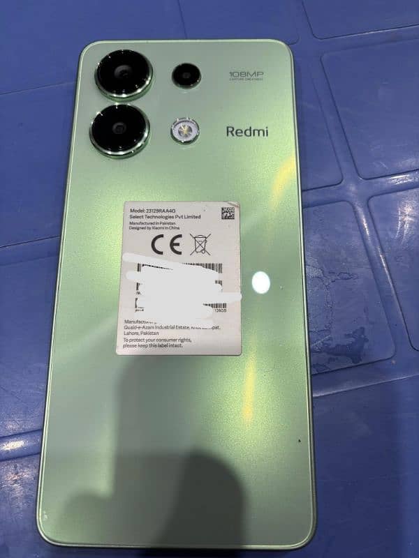 Redmi note 13 mint green color. 6