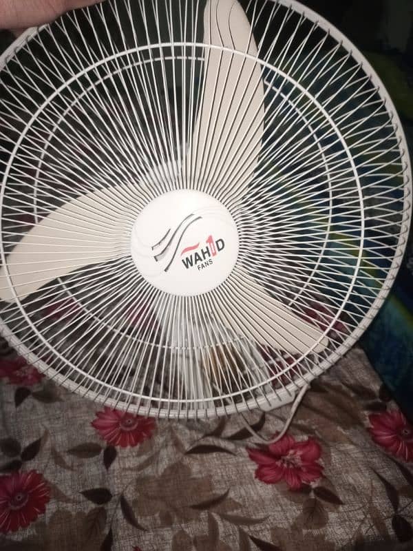 bracket fan and table fan in good condition 1