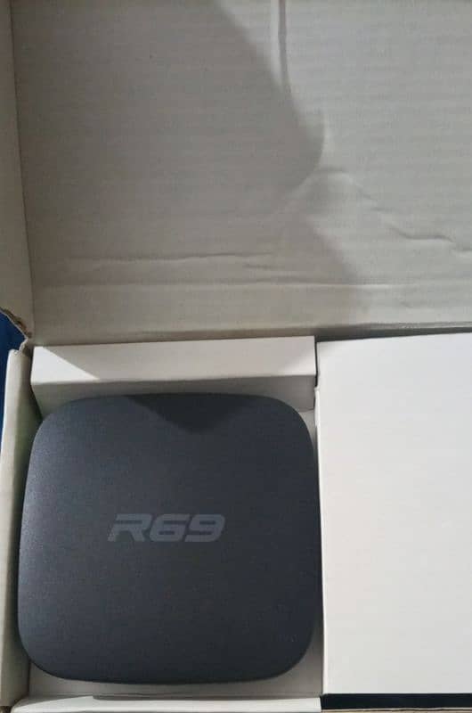 smart TV box (R 69 RAM 4 GB ROM 64 GB Android 11) 1