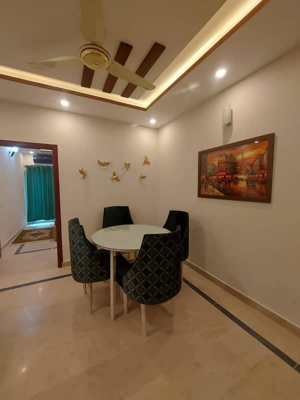 Two-bedroom fully furnished apartment with a lounge and kitchen fully furnished. 2
