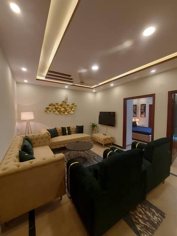 Two-bedroom fully furnished apartment with a lounge and kitchen fully furnished. 3