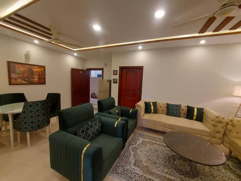 Two-bedroom fully furnished apartment with a lounge and kitchen fully furnished. 4
