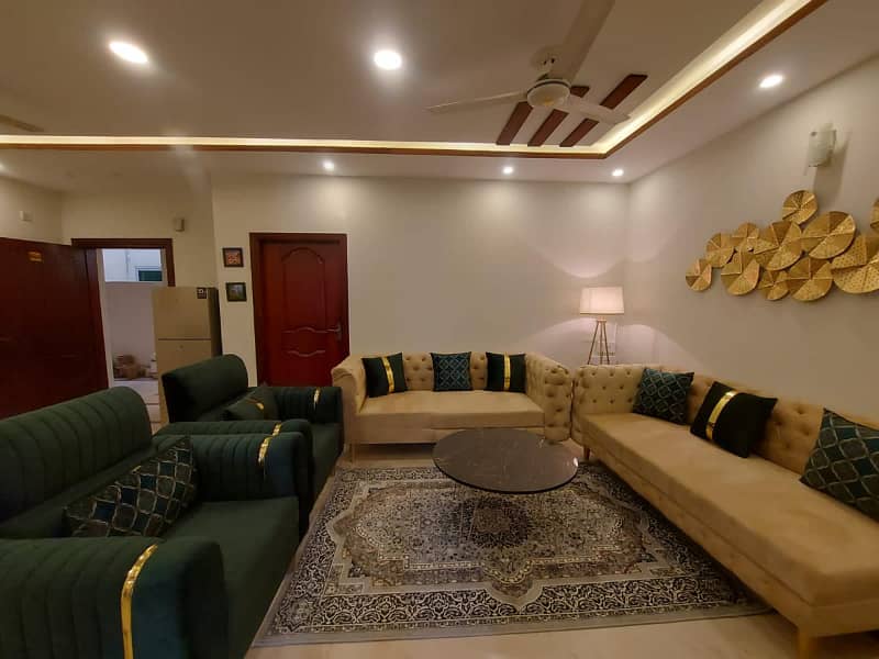 Two-bedroom fully furnished apartment with a lounge and kitchen fully furnished. 5