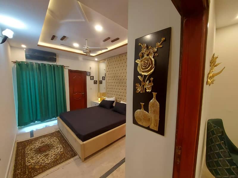 Two-bedroom fully furnished apartment with a lounge and kitchen fully furnished. 6
