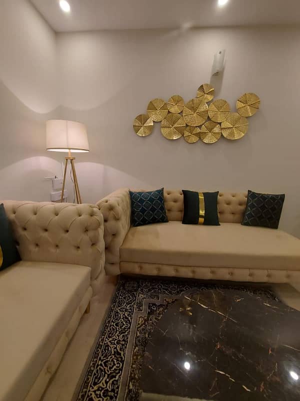 Two-bedroom fully furnished apartment with a lounge and kitchen fully furnished. 7