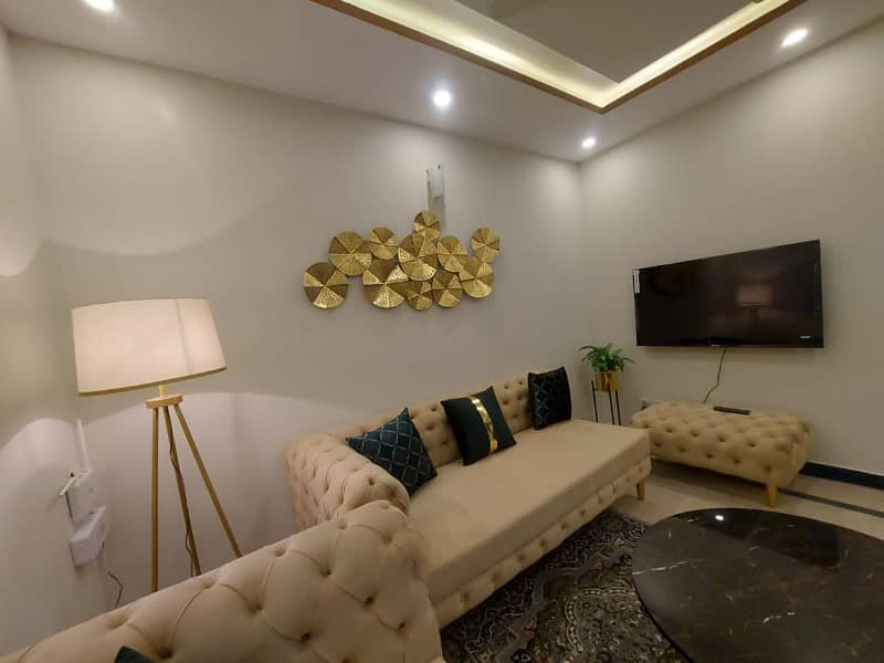Two-bedroom fully furnished apartment with a lounge and kitchen fully furnished. 8