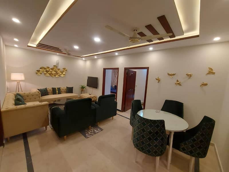 Two-bedroom fully furnished apartment with a lounge and kitchen fully furnished. 9