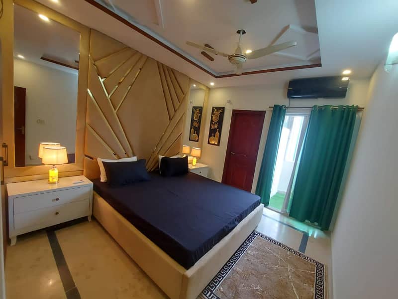 Two-bedroom fully furnished apartment with a lounge and kitchen fully furnished. 10