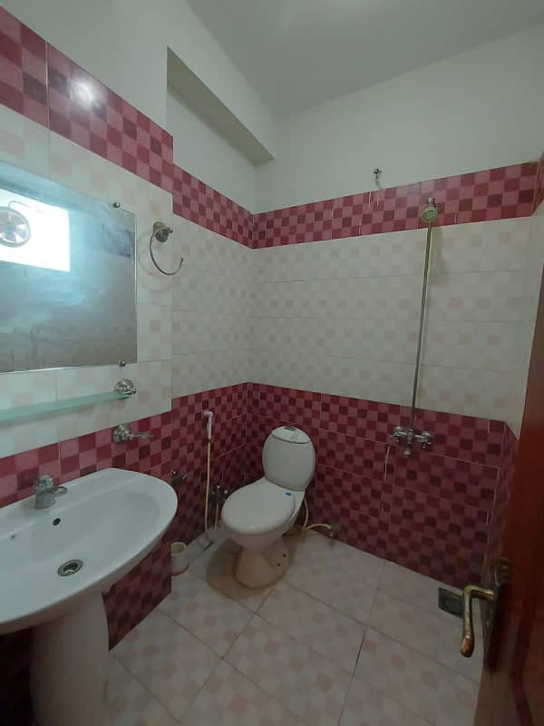 Two-bedroom fully furnished apartment with a lounge and kitchen fully furnished. 12