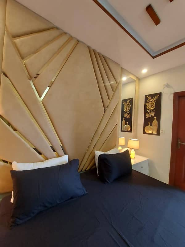 Two-bedroom fully furnished apartment with a lounge and kitchen fully furnished. 13