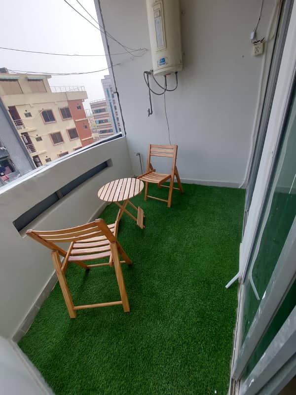 Two-bedroom fully furnished apartment with a lounge and kitchen fully furnished. 15