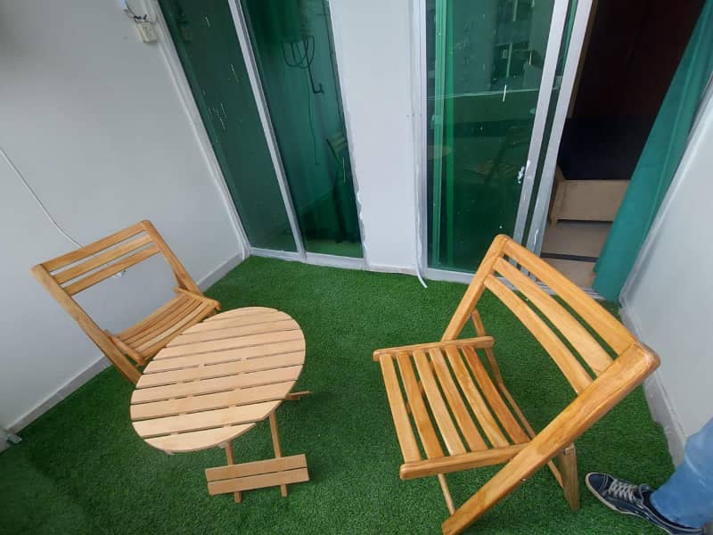 Two-bedroom fully furnished apartment with a lounge and kitchen fully furnished. 16