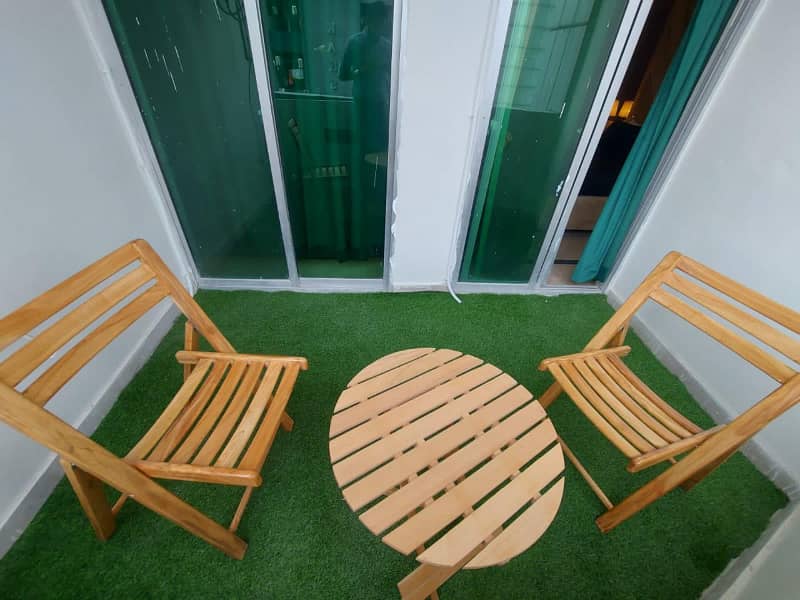 Two-bedroom fully furnished apartment with a lounge and kitchen fully furnished. 17