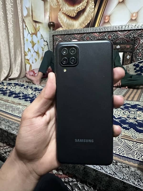 samsung A12 4/64 black color 10/10 condition only phone 4