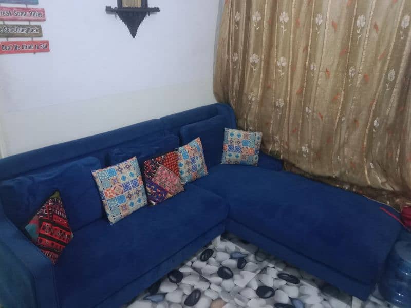 L. shap sofa in blue colour 0