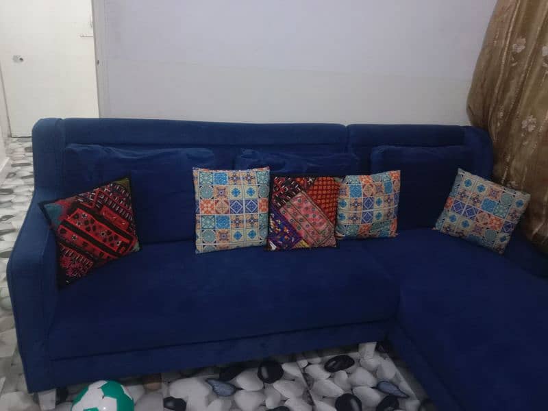 L. shap sofa in blue colour 1