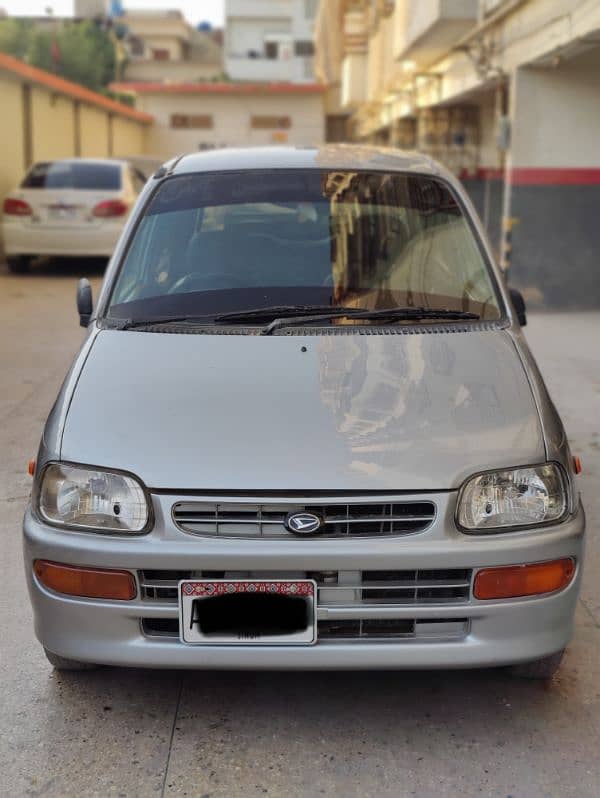 Daihatsu Cuore 2010 original paint factory cng 0
