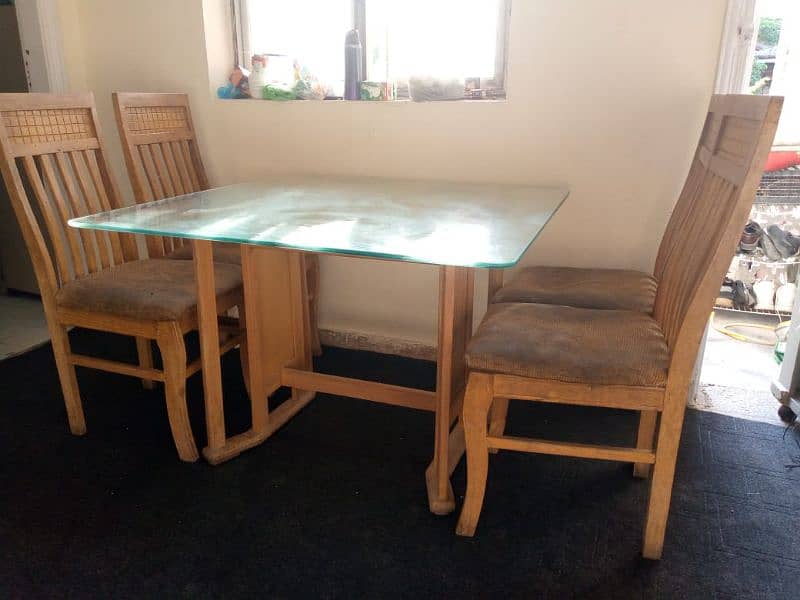 Used Dinning Table With 4 Chairs. In good condition. 2