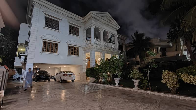 VIP location of DHA phase Vl,1000yards Bungalow khbe shujat 2+4 Bedroom drawing dining launch kitchen with lush Green loan Big parking Space Furnished Rent 15/ unfurnished 11Lac. 1