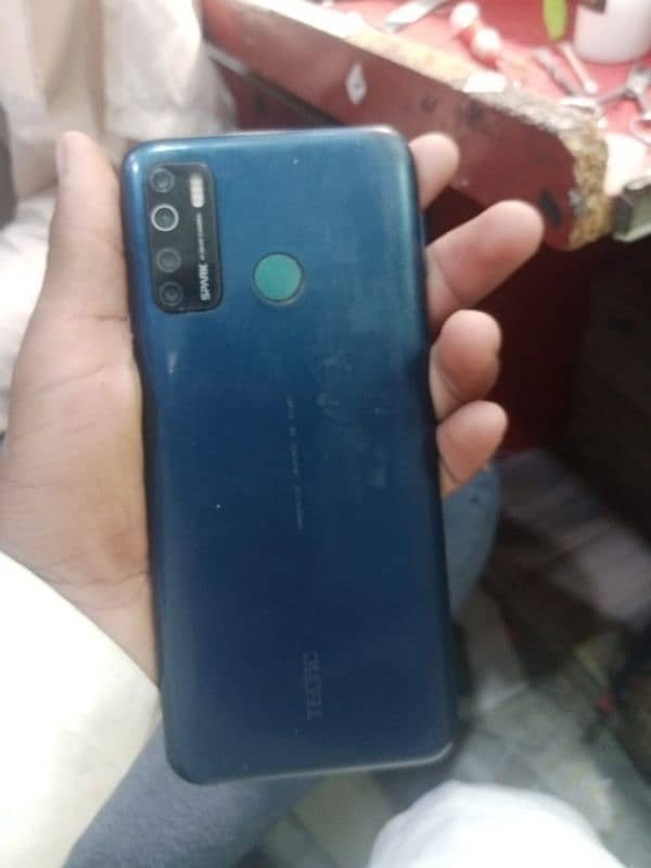 Tecno cemon 15 fingre not working back change 4/ 64GB. 1