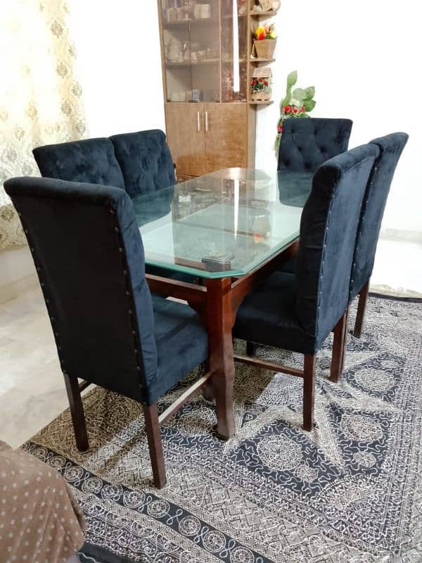 6 Seater Dining table and foam chairs in excellent condition for sale. 0