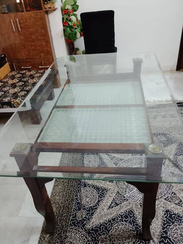 6 Seater Dining table and foam chairs in excellent condition for sale. 2