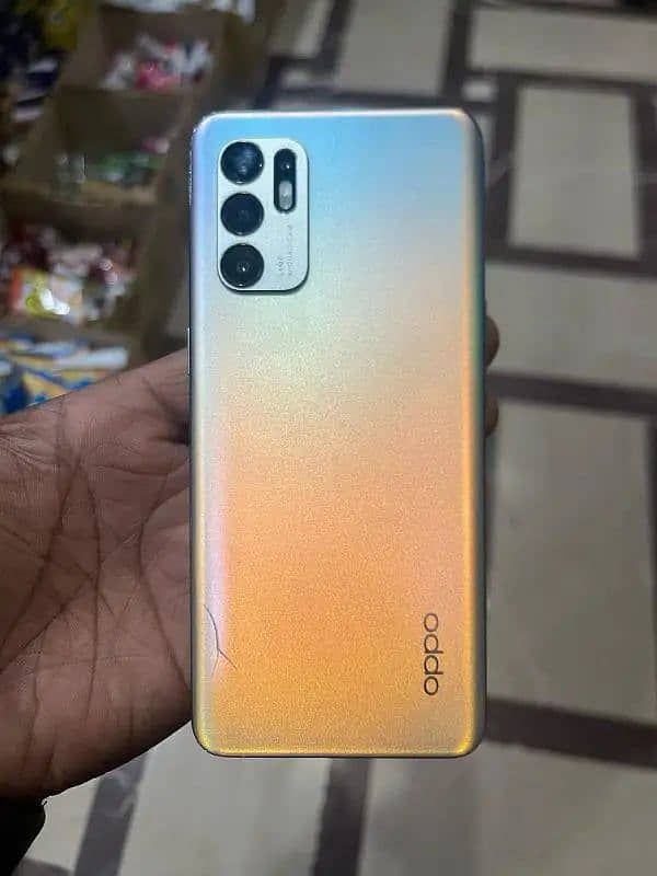 oppo Reno 6)-8+8/128 (with complete box) 0