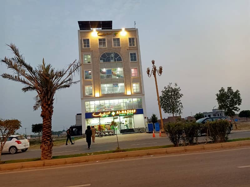 8 Marla Commercial Plot For Sale on 120 Feet Road In G 3 Block Phase 4 Bahria Orchard Lahore. 12