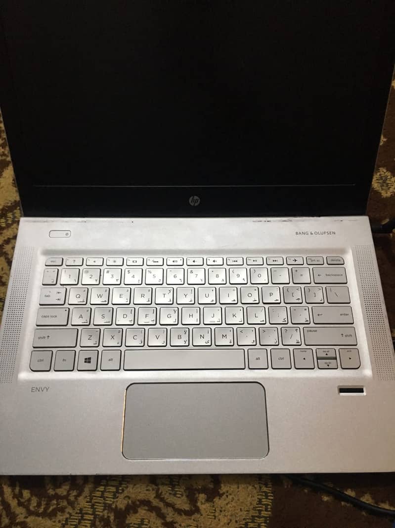 The laptop in the image is an HP Envy series model 3